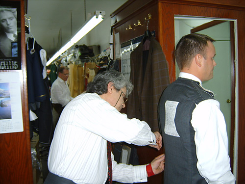 some guy getting a suit fitting at Spiros (Spiros at left). some guy getting a suit fitting at Spiros (Spiros at left).